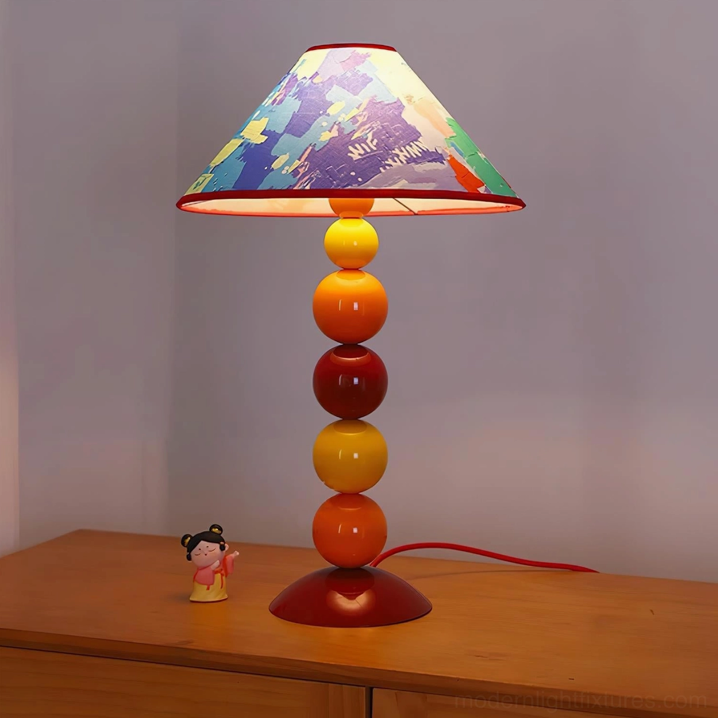 Modern decorative table lamp with flowing pattern shade and warm-toned spherical post - artistic home accent lighting
