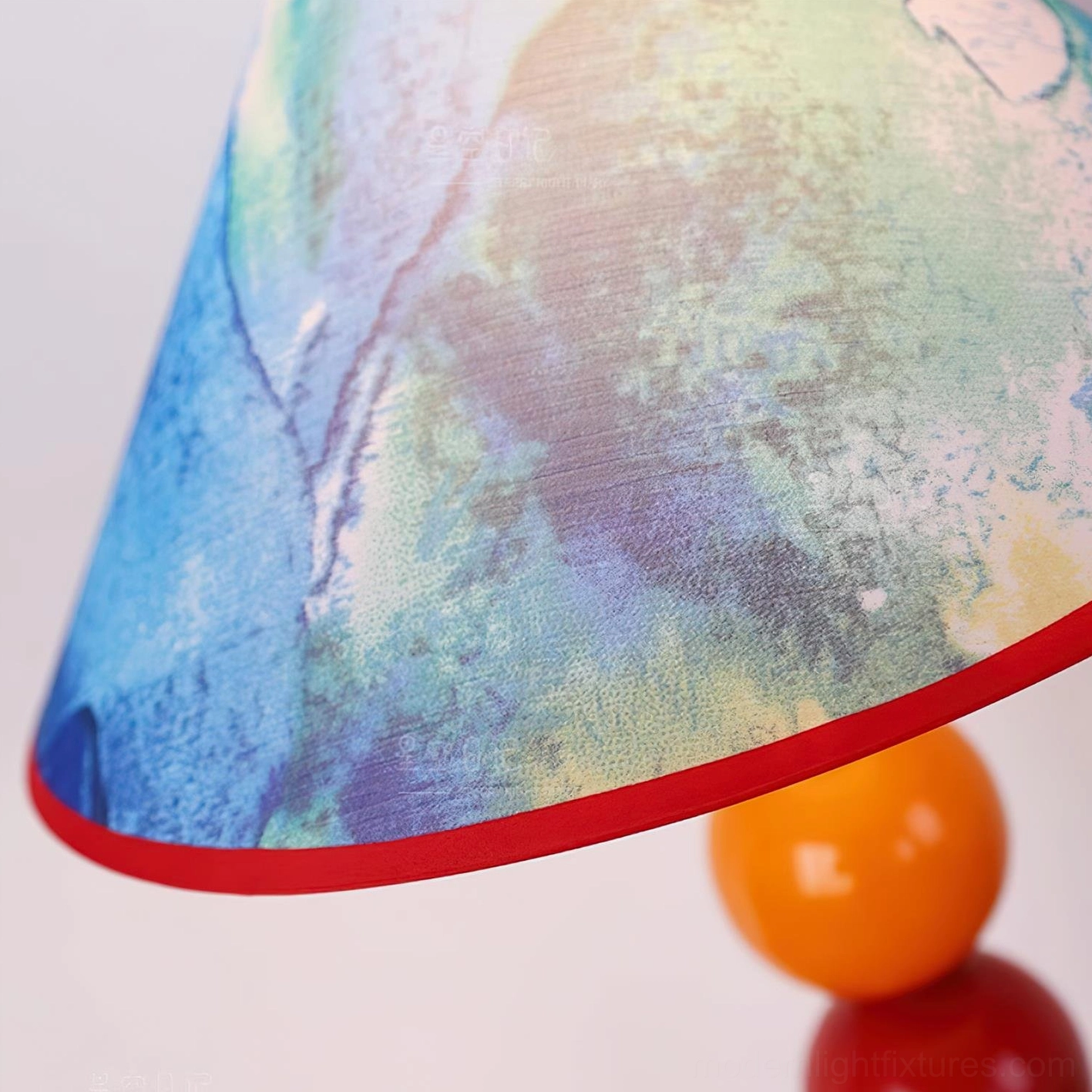 Contemporary colorful table lamp with playful artistic design and warm color palette - eclectic home interior accent