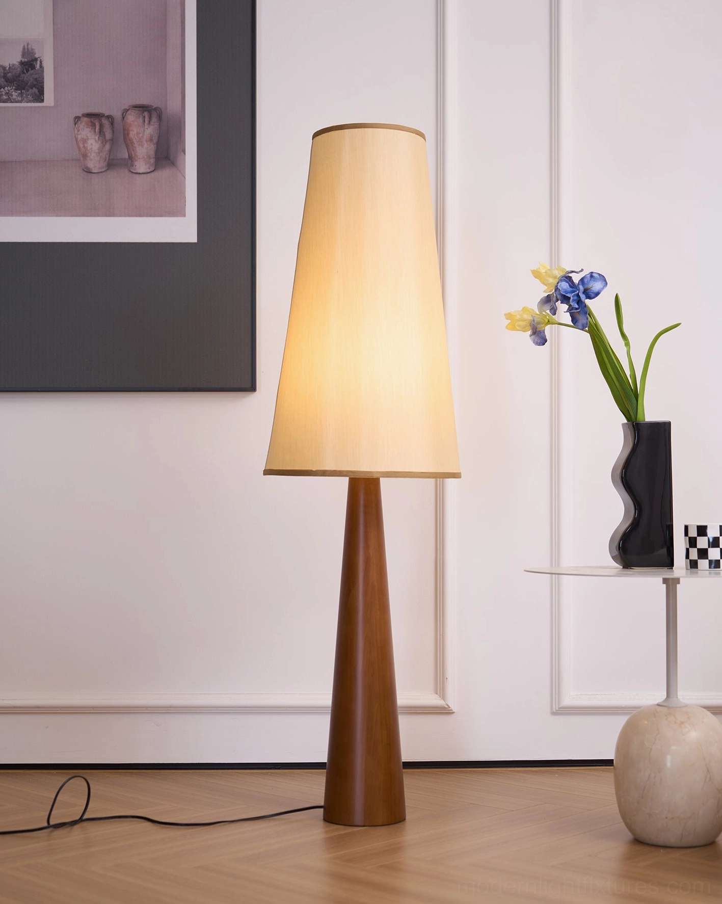 Svelte floor lamp tapered wooden base detailed craftsmanship handmade construction