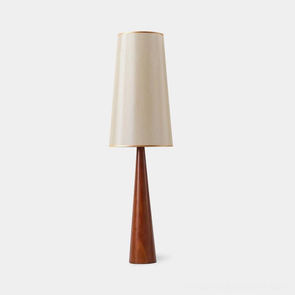 Svelte minimalist tapered floor lamp with fabric shade, walnut wood finish, front view studio photo