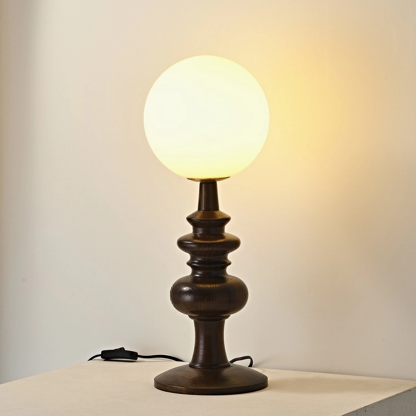 Sveta modern globe table lamp detail view - frosted glass shade with wood base construction