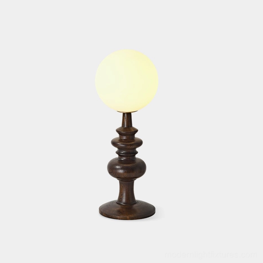 Sveta globe table lamp with dark walnut wood base and frosted glass shade - front view studio photography
