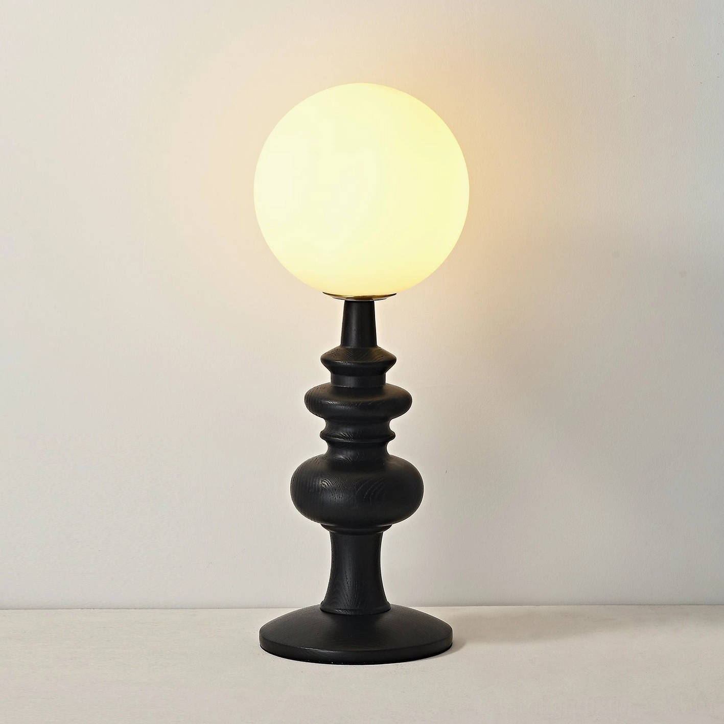 Sveta wood base table lamp close-up - craftsmanship detail of turned ash wood construction