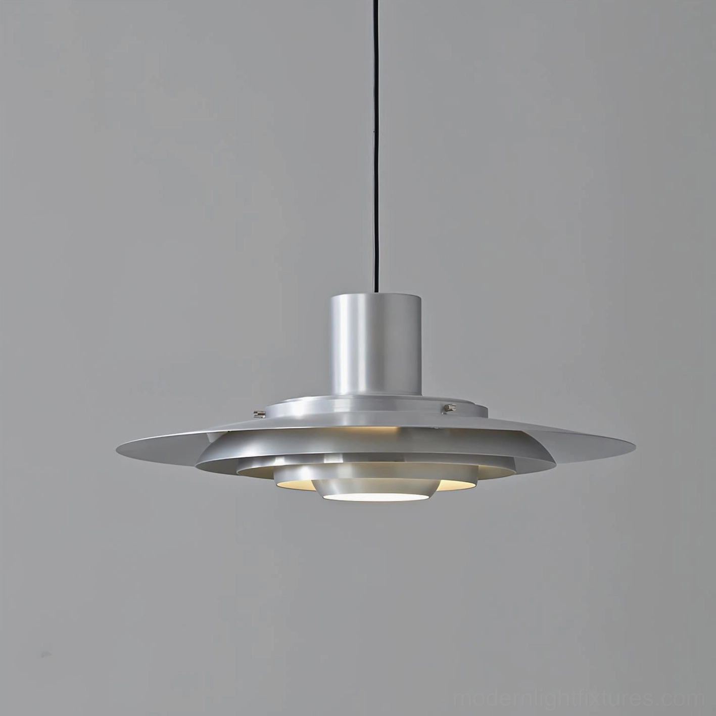 Modern swing arm pendant light fixture detail showcasing articulated arm mechanism and adjustable positioning capability