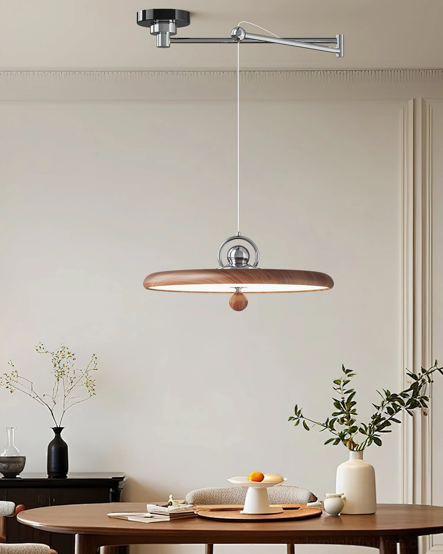 Retro-inspired swing arm pendant lamp with walnut brown disc shade in warm dining space, creating intimate atmosphere