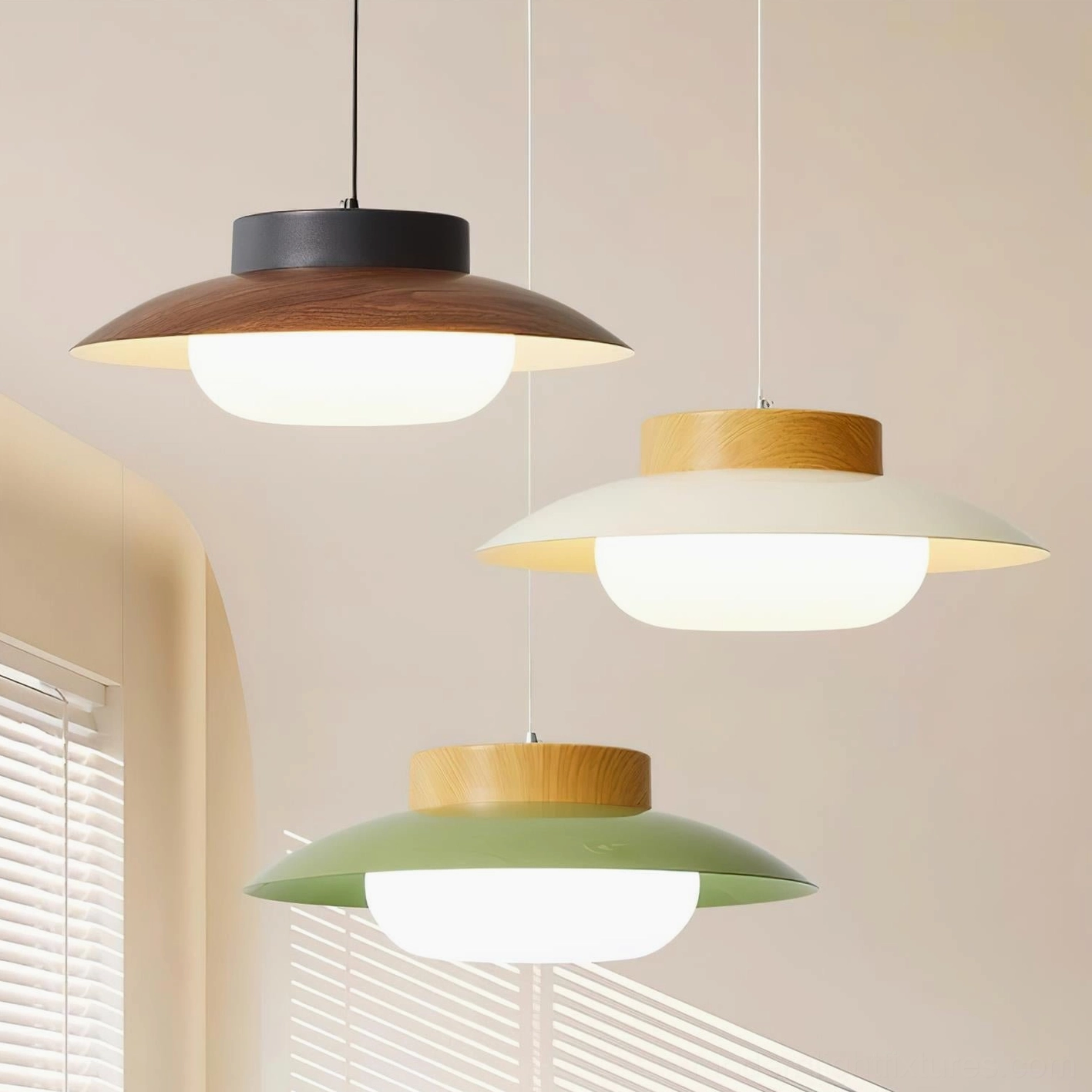Adjustable swing arm pendant lamp positioned at various angles demonstrating flexible light direction capability