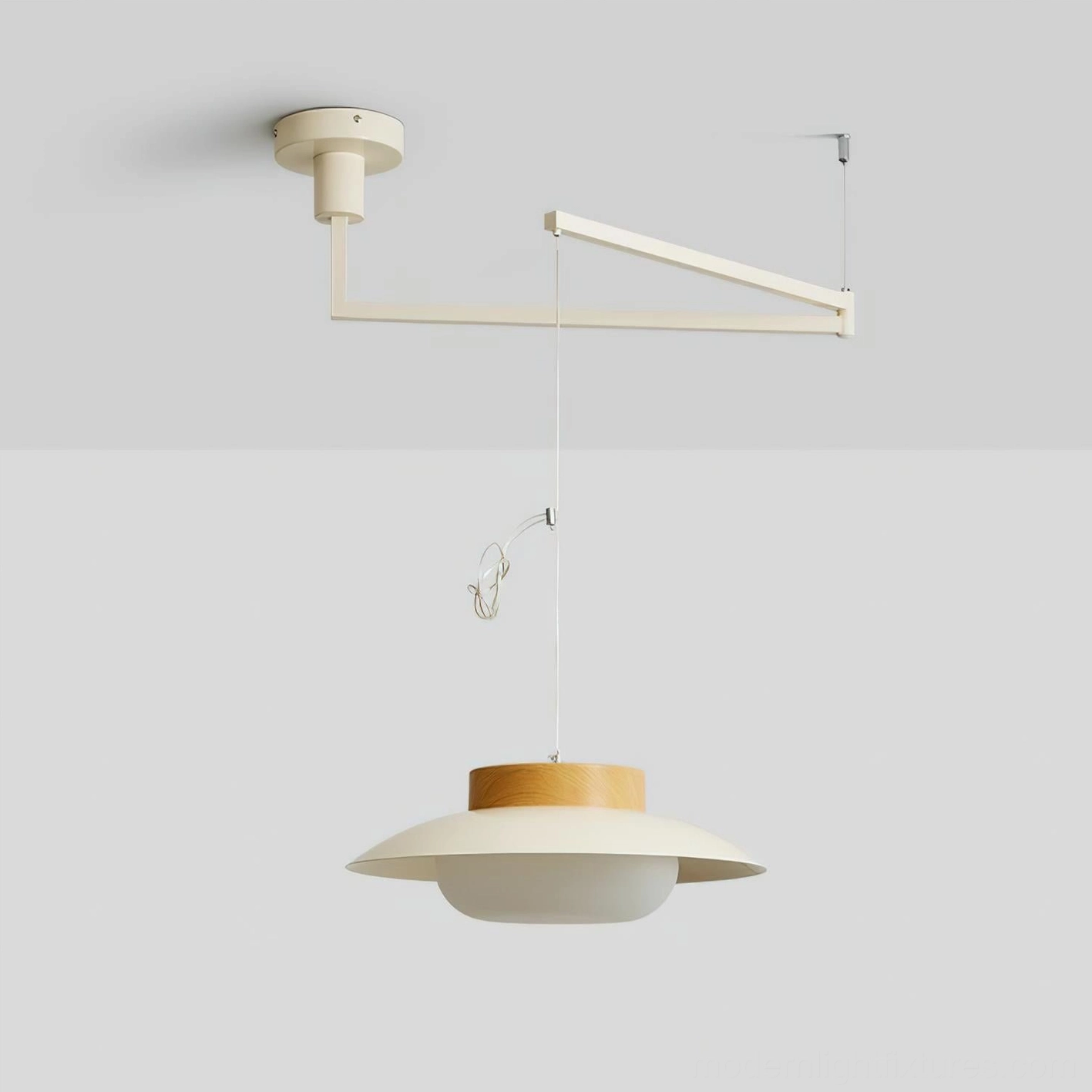 Modern swing arm pendant light suspended in architectural interior demonstrating statement design and functionality