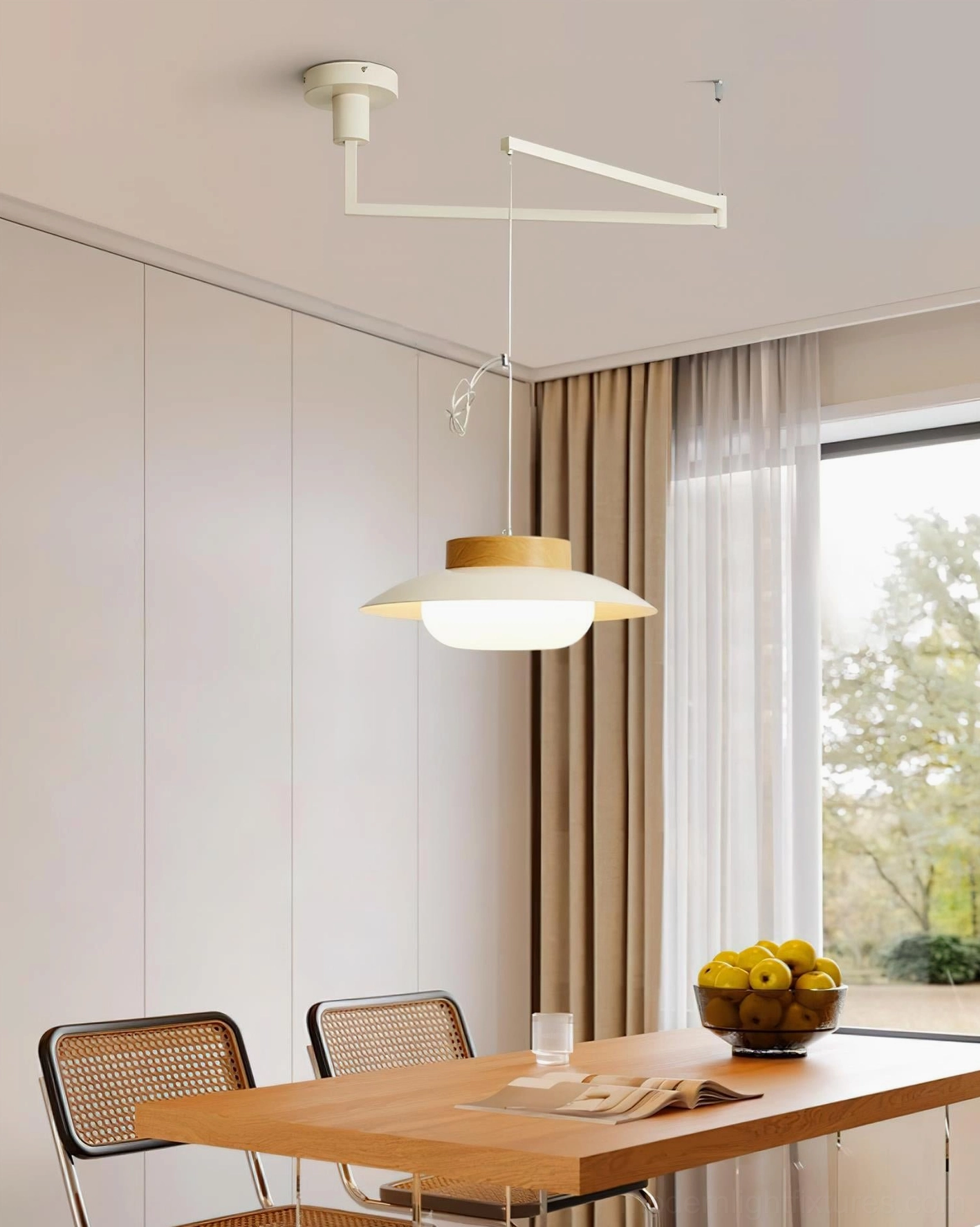Adjustable swing arm pendant fixture detail showing smooth articulation mechanism and metal craftsmanship