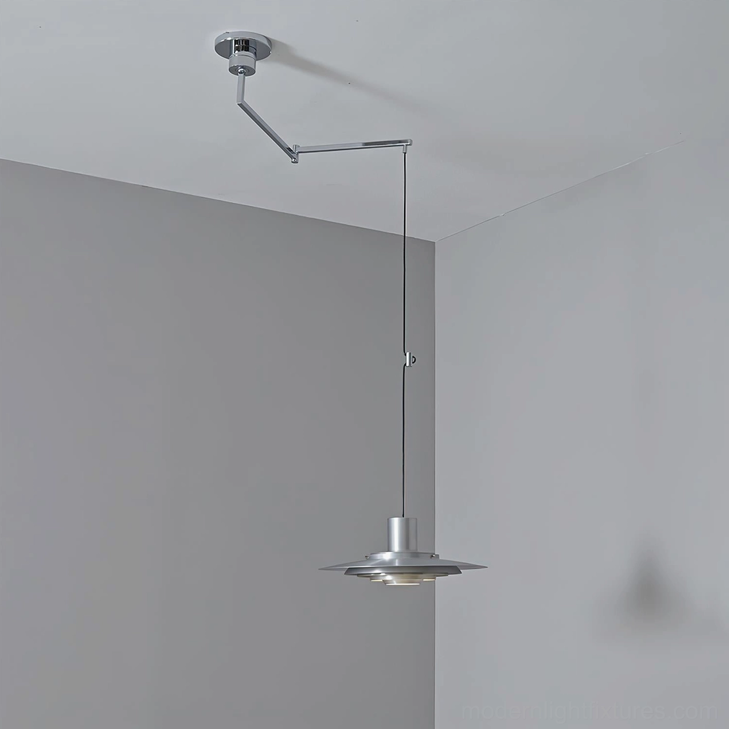 Swing arm pendant light mounted on ceiling corner in modern residential interior, demonstrating flexible positioning and architectural integration