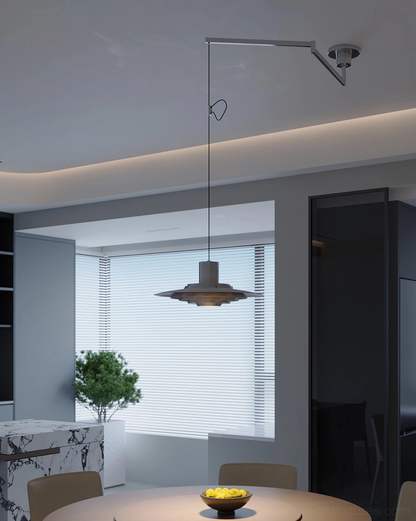 Swing arm pendant light installed above round dining table in modern residential dining room, creating focused task lighting ambiance