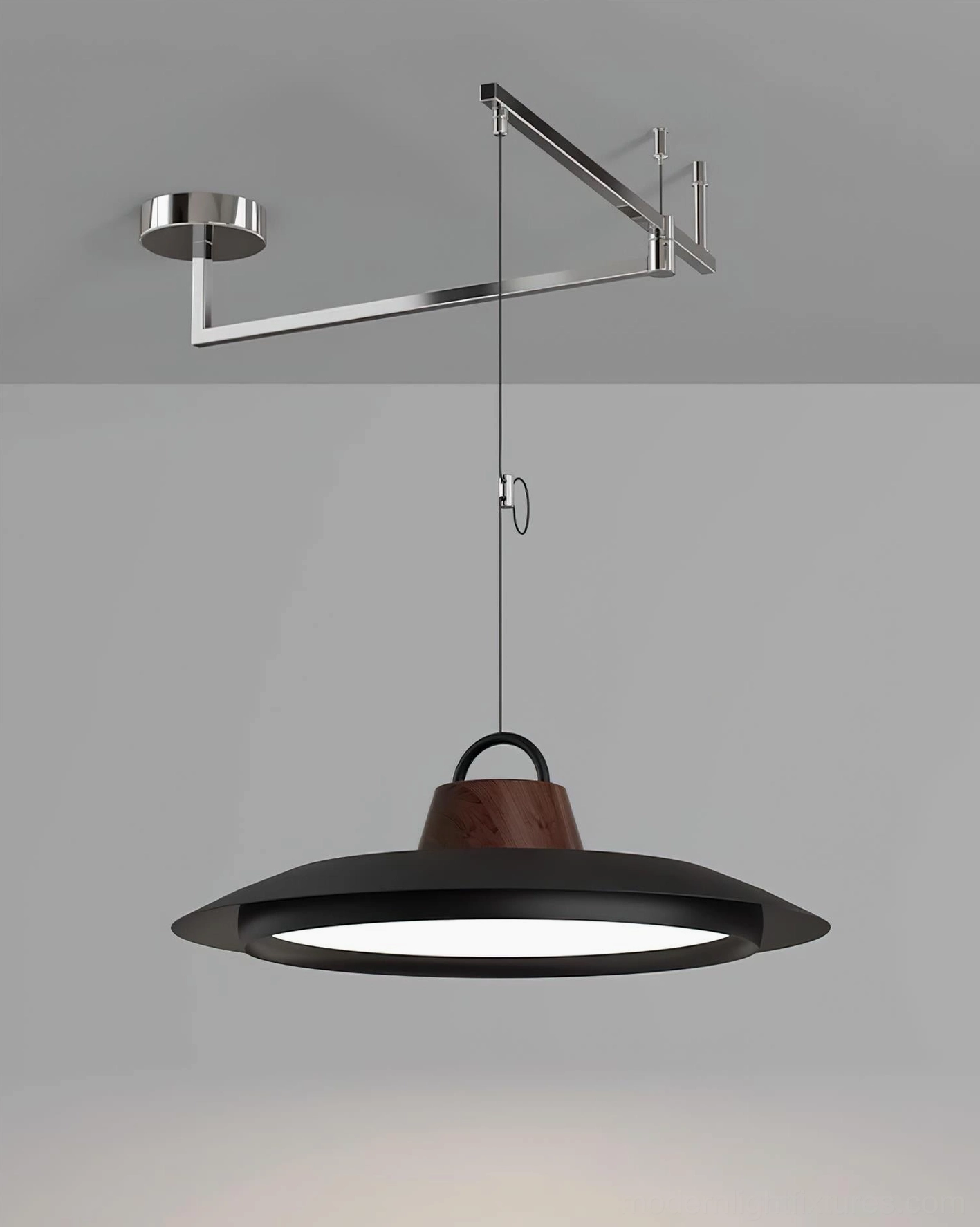 Modern swing arm pendant light close-up of metal frame construction and material quality