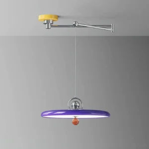 Adjustable swing arm pendant fixture showing side profile with purple acrylic disc shade and articulating chrome arm mechanism