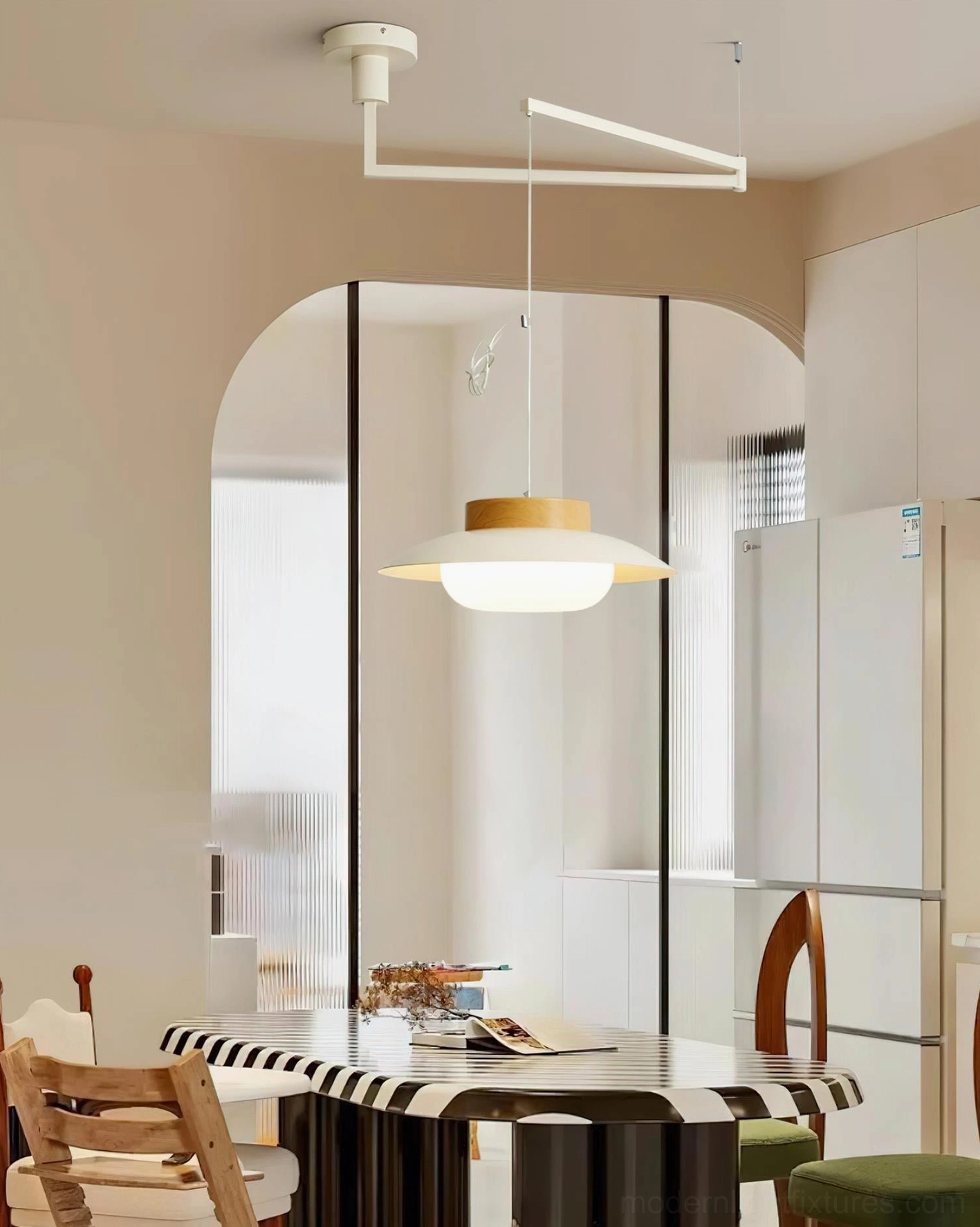 Swing arm pendant lamp installation in residential interior showing practical task and ambient lighting application