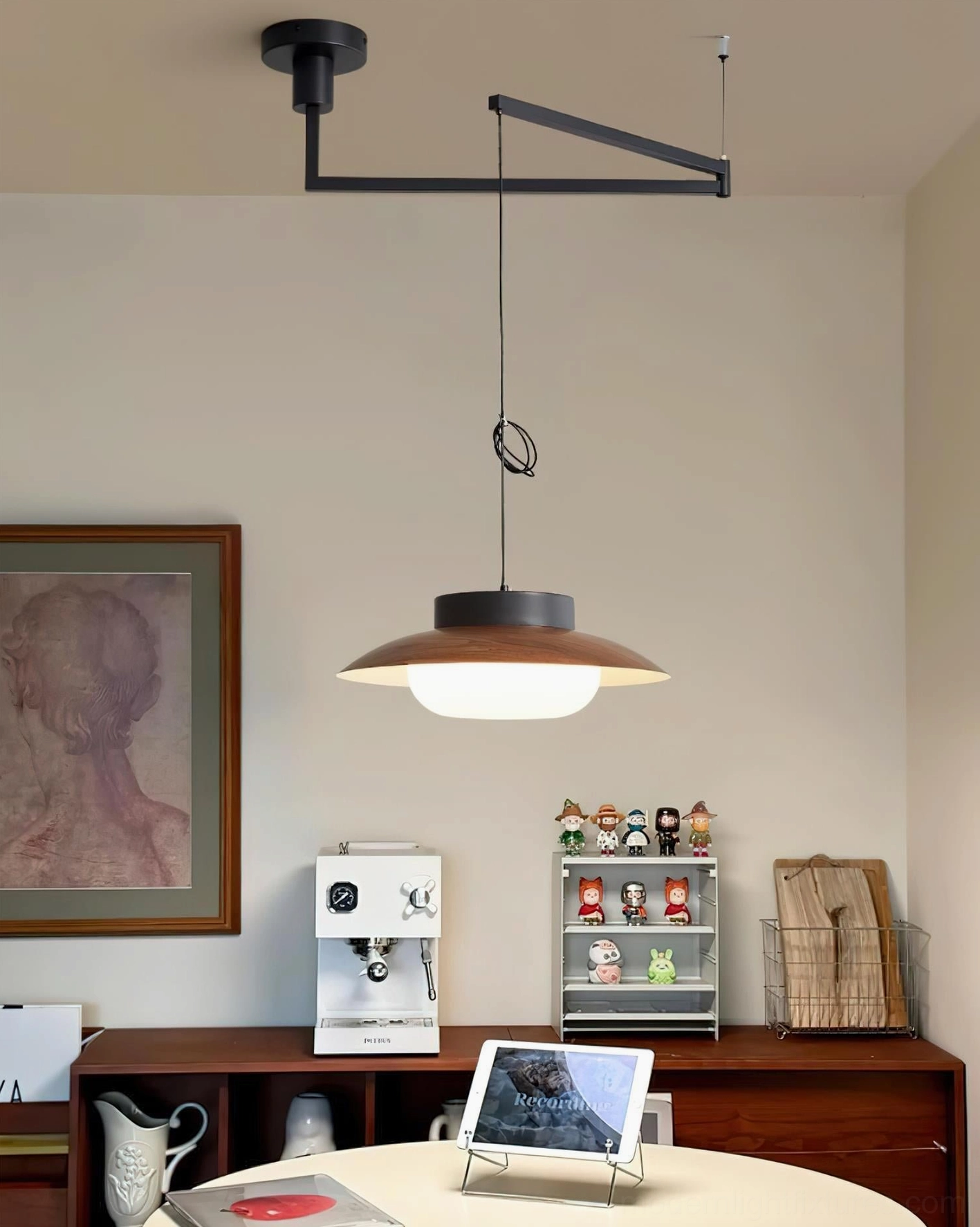 Swing arm pendant light in contemporary interior showing warm 3000K LED light output and ambient glow