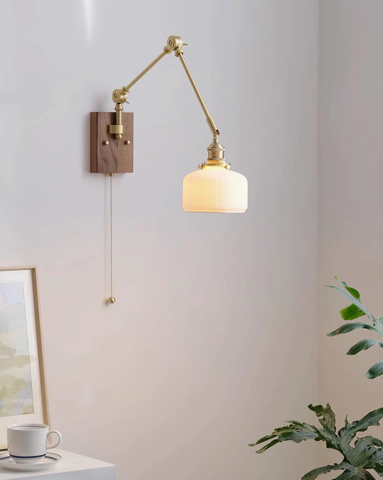 Swing arm wall sconce home office reading light beside desk and bookshelf, task lighting