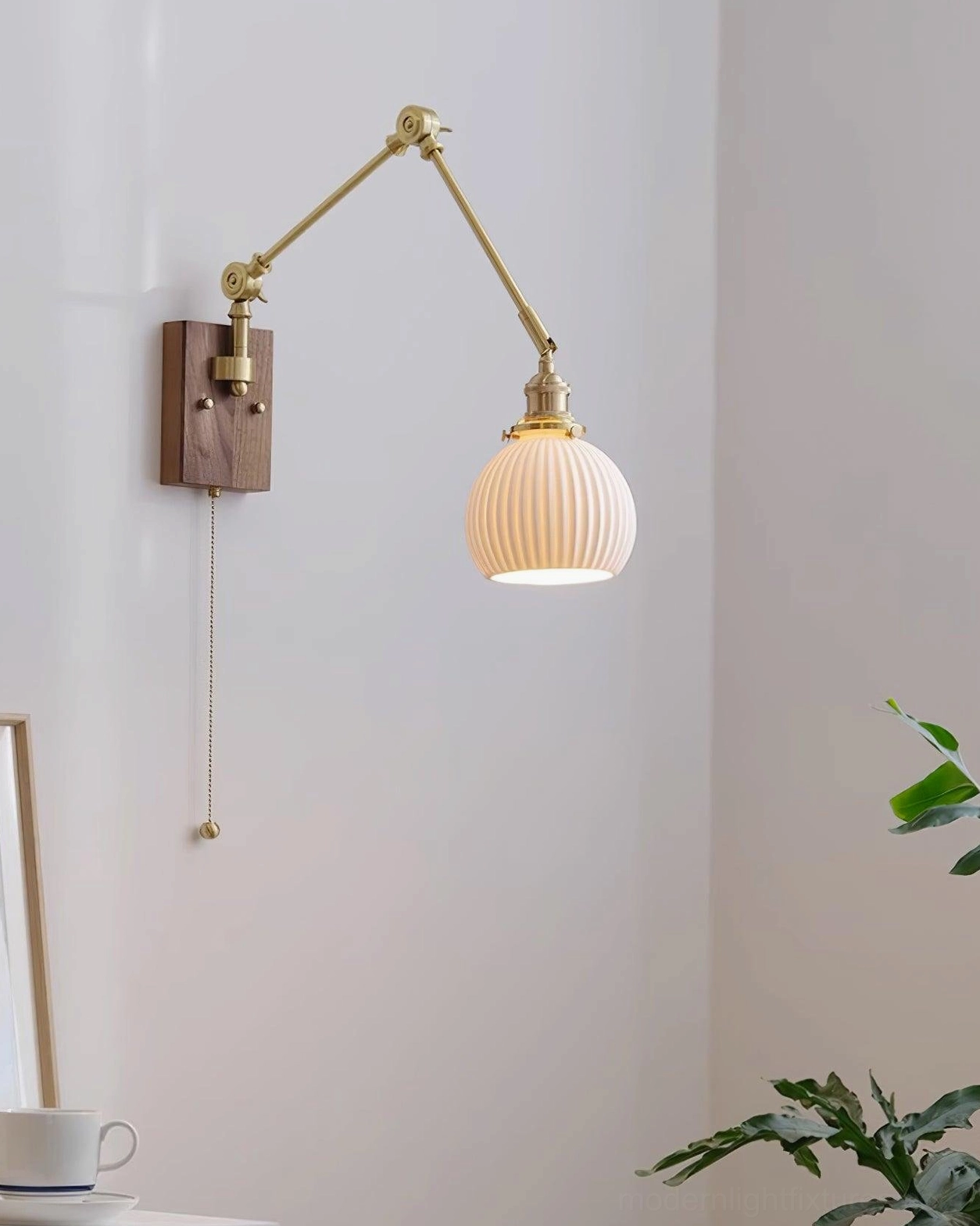 Swing arm sconce covered outdoor patio and portico installation with damp-rated lighting