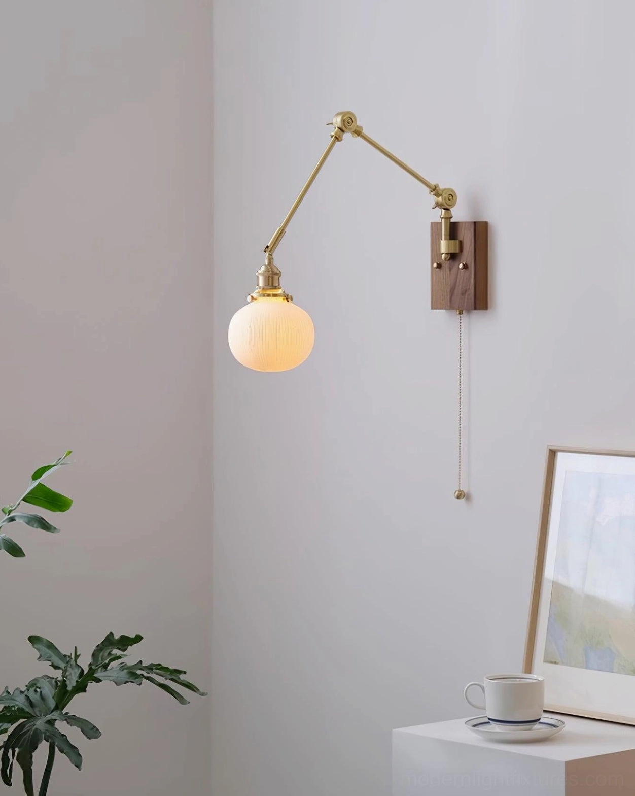 Swing arm sconce in Scandinavian interior design setting with natural wood furnishings