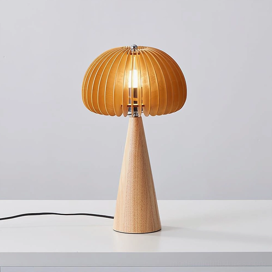 Sylora wooden table lamp with visible glowing bulb and polished metal lamp holder detail, close-up studio view