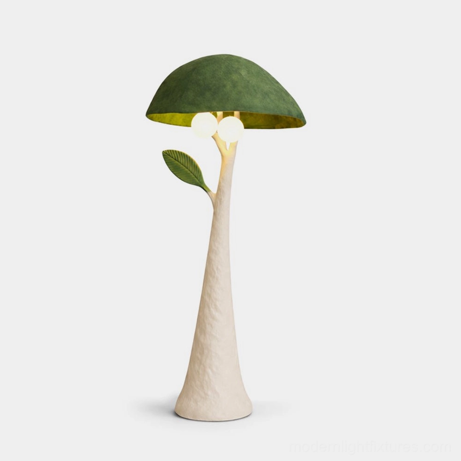 Sylvara mushroom floor lamp with green velvet shade and beige textured resin pole featuring leaf accent detail, front view against white background