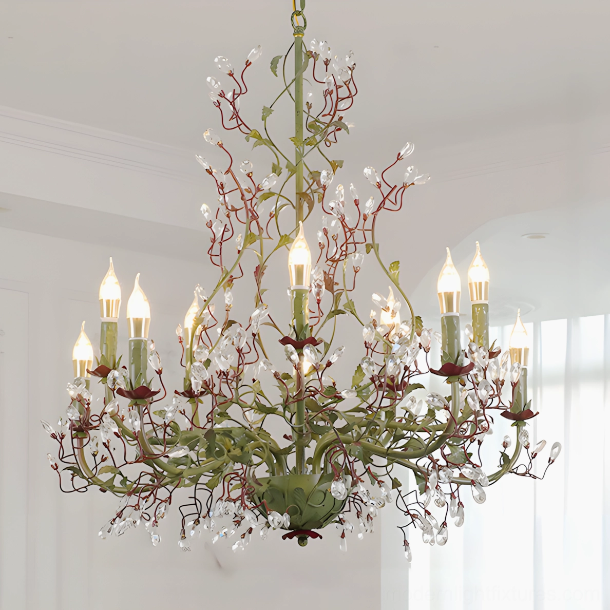 Sylvarose floral branch crystal chandelier with red-brown metalwork and candle-style lights in sunlit room