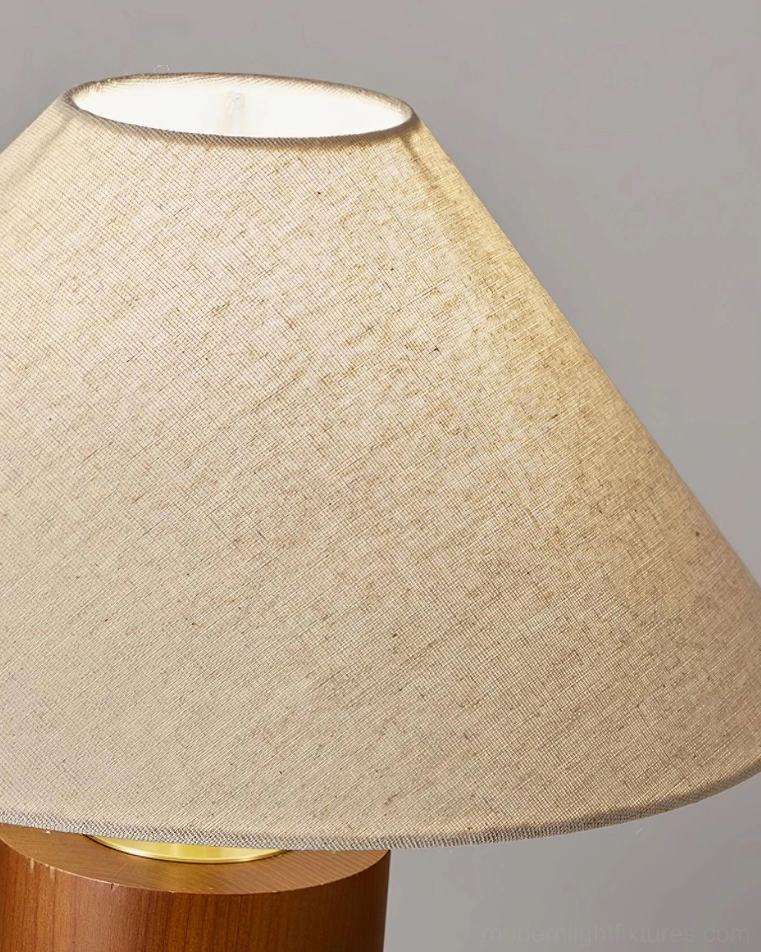 Table lamp displaying multiple finish options in walnut and natural wood colors side by side