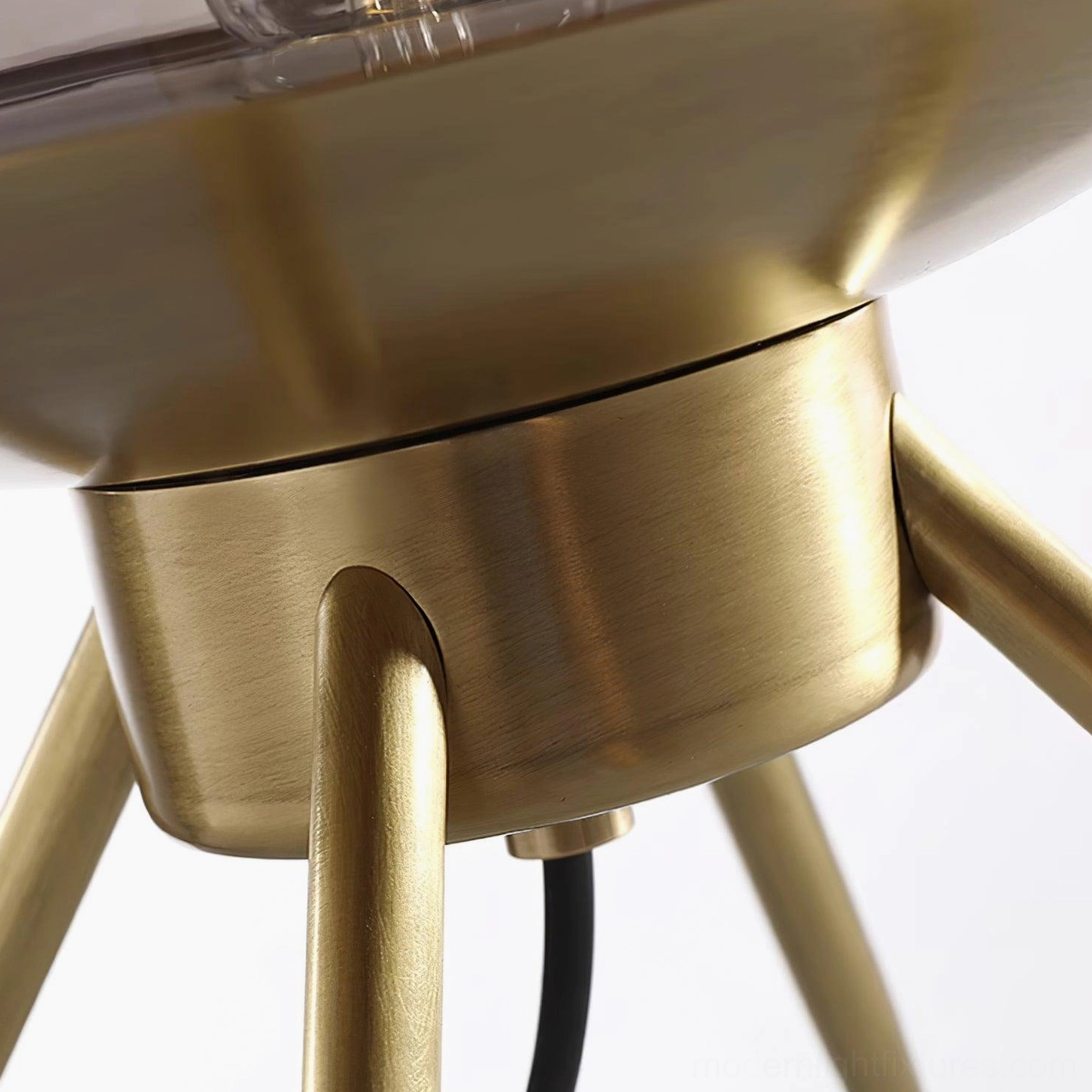 Three color variant tiered glass table lamps side by side showing amber, gradient blue, and smoke gray options