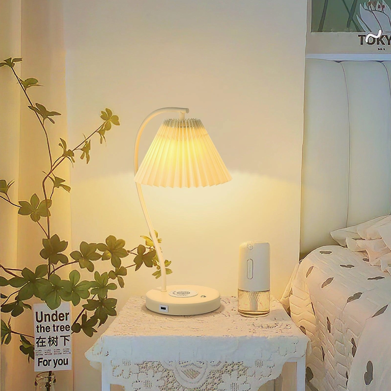 Modern pleated table lamp showing USB charging port at base functionality