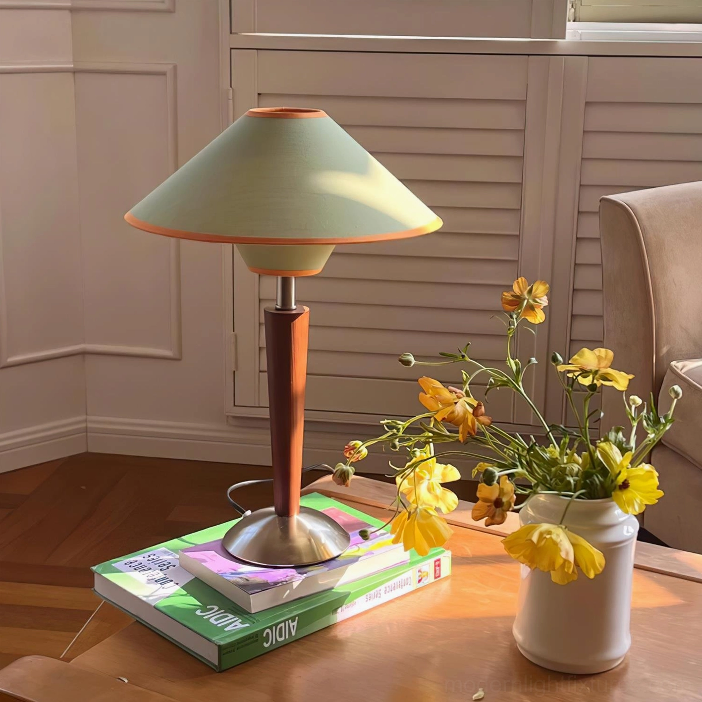 Contemporary fabric shade table lamp in warm lighting showing ambient glow and cozy living room ambiance