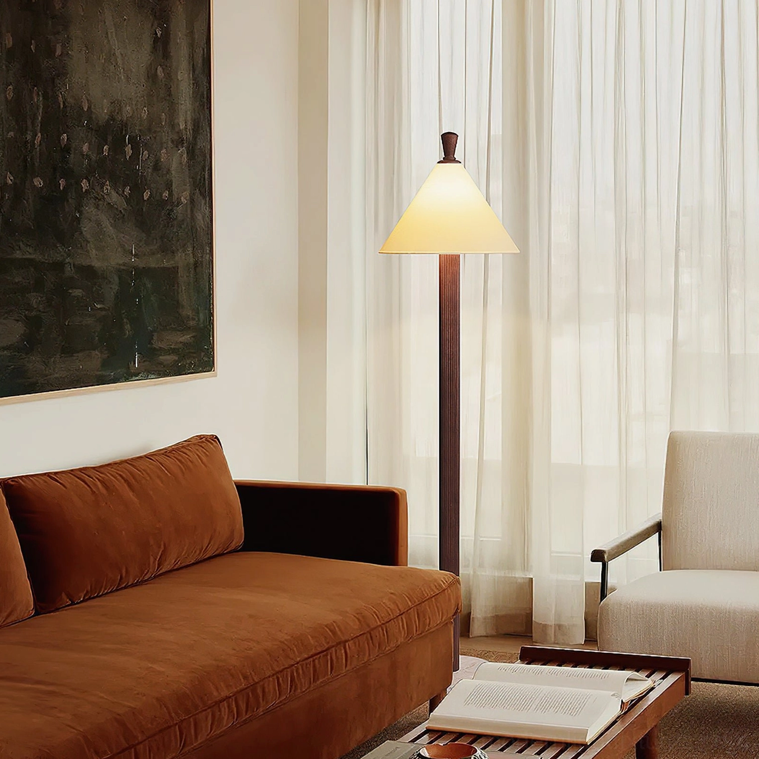 Takumi Japanese-inspired floor lamp beside brown sofa in warm neutral living room home decor