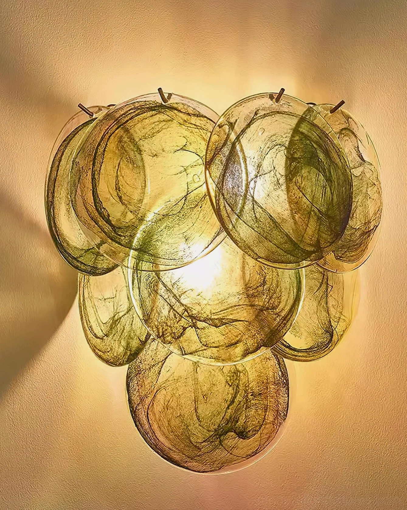 Talia artisanal hand-blown glass wall sconce fixture featuring sculptural bubble design and warm iridescent glow, modern artistic wall lamp
