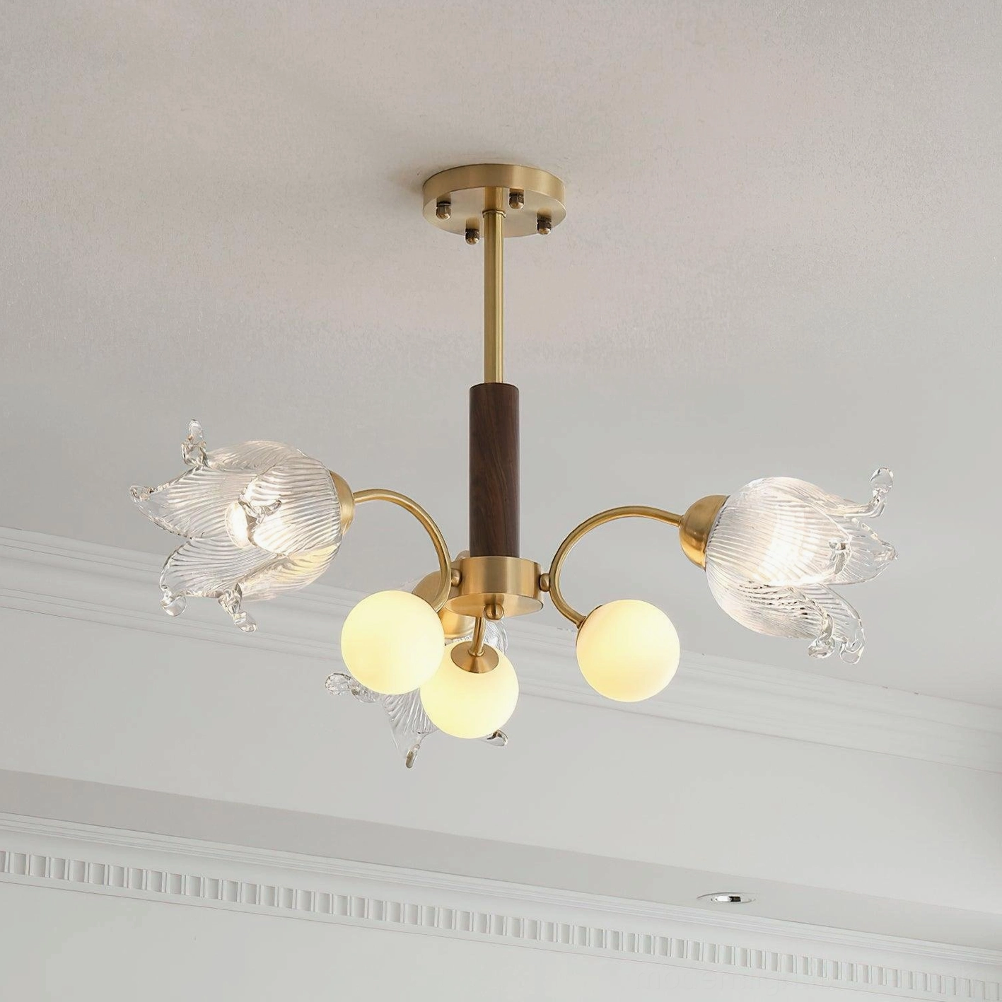 Talia modern 3-head chandelier detail view with hand-pleated glass shades brass frame