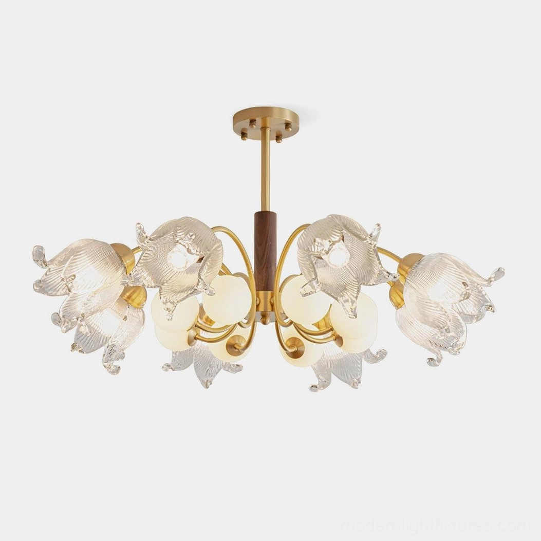 Talia modern chandelier front view with brass frame, walnut wood accents, and pleated glass shades on white background