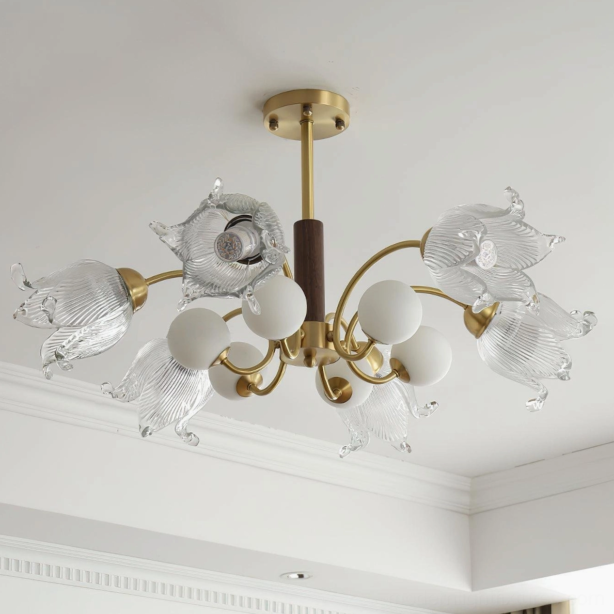 Talia modern chandelier side ceiling perspective showing pleated glass shades and frosted white spheres