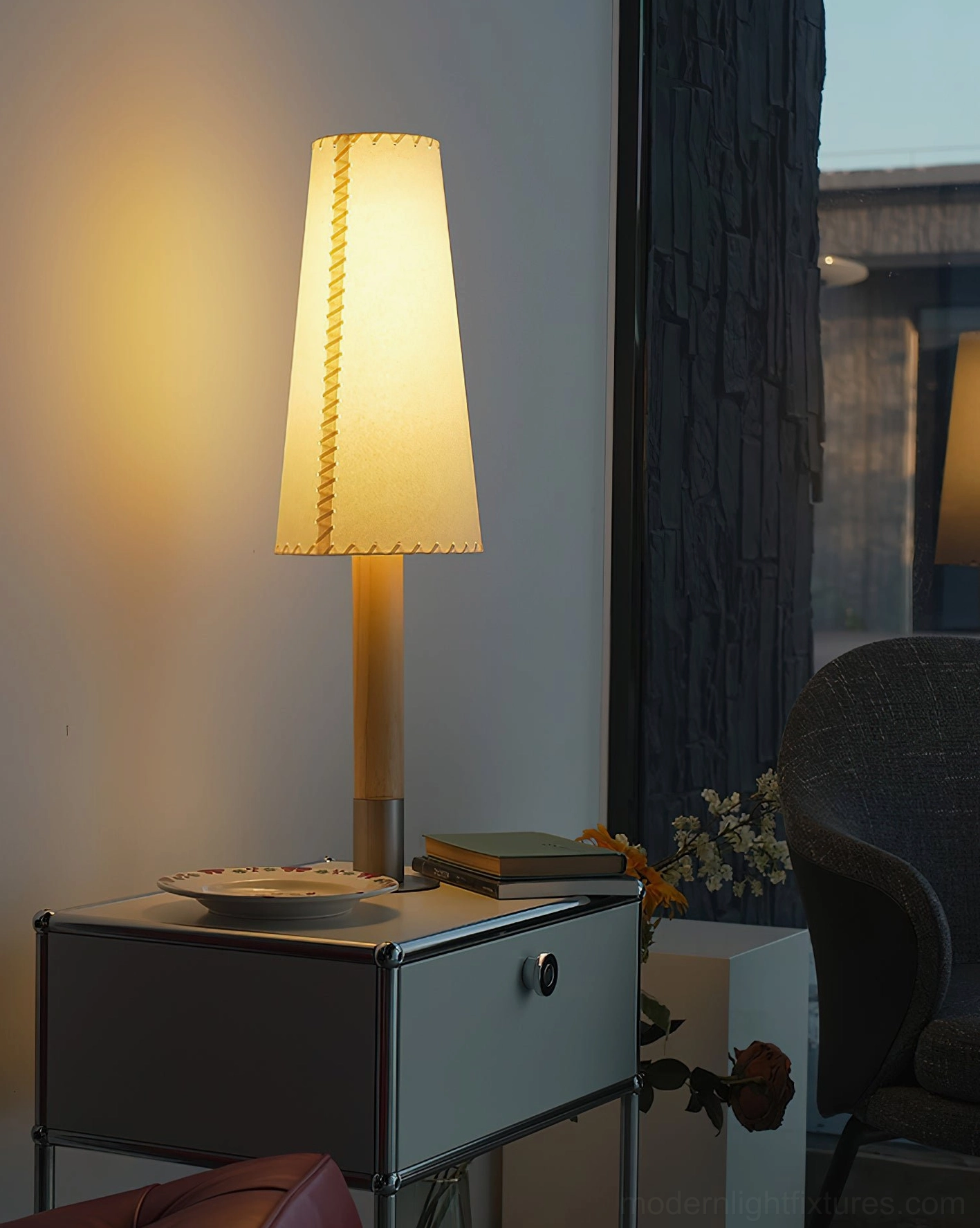 Tall tapered table lamp with warm ambient lighting on bedroom nightstand - Nordic minimalist style