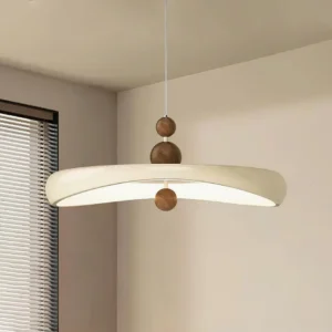 Modern dining room featuring Talon pendant lamp above dining table, interior design with warm neutral tones