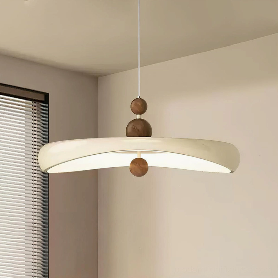 Modern dining room featuring Talon pendant lamp above dining table, interior design with warm neutral tones