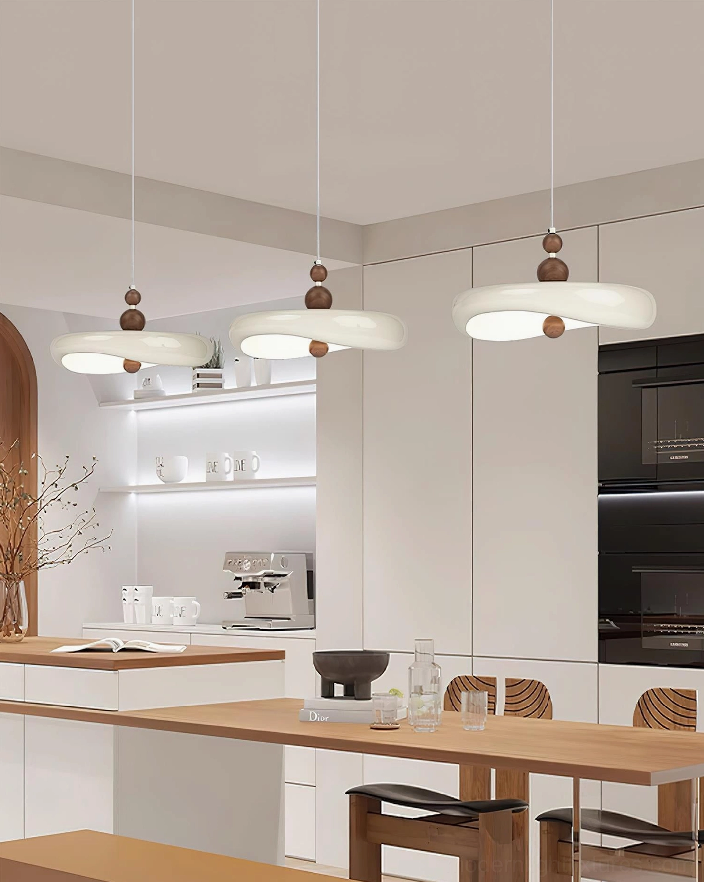 Minimalist Talon pendant light fixture compatible with sloped ceilings up to 30 degrees
