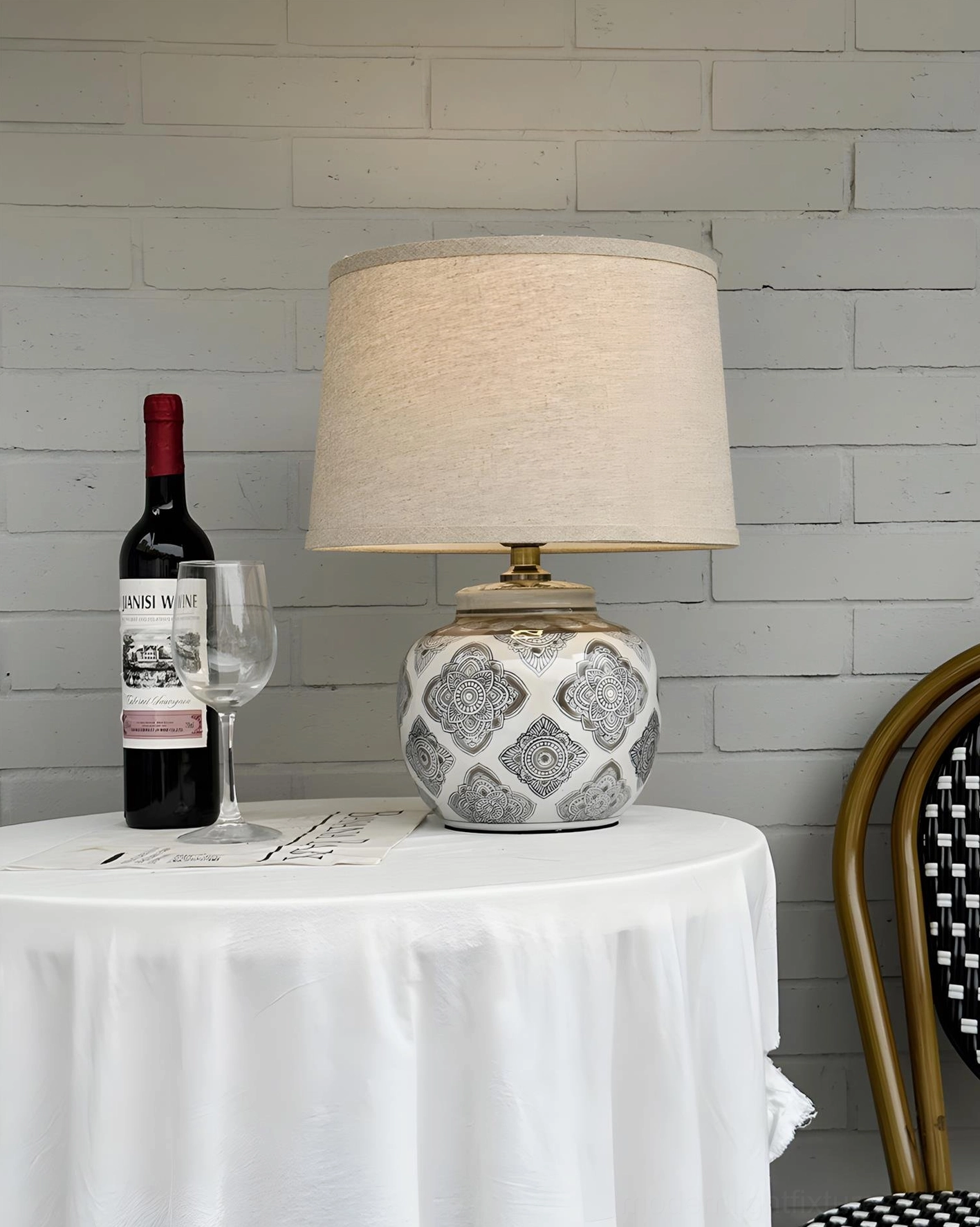 Talora ceramic drum lamp with linen shade showing light diffusion and warm glow