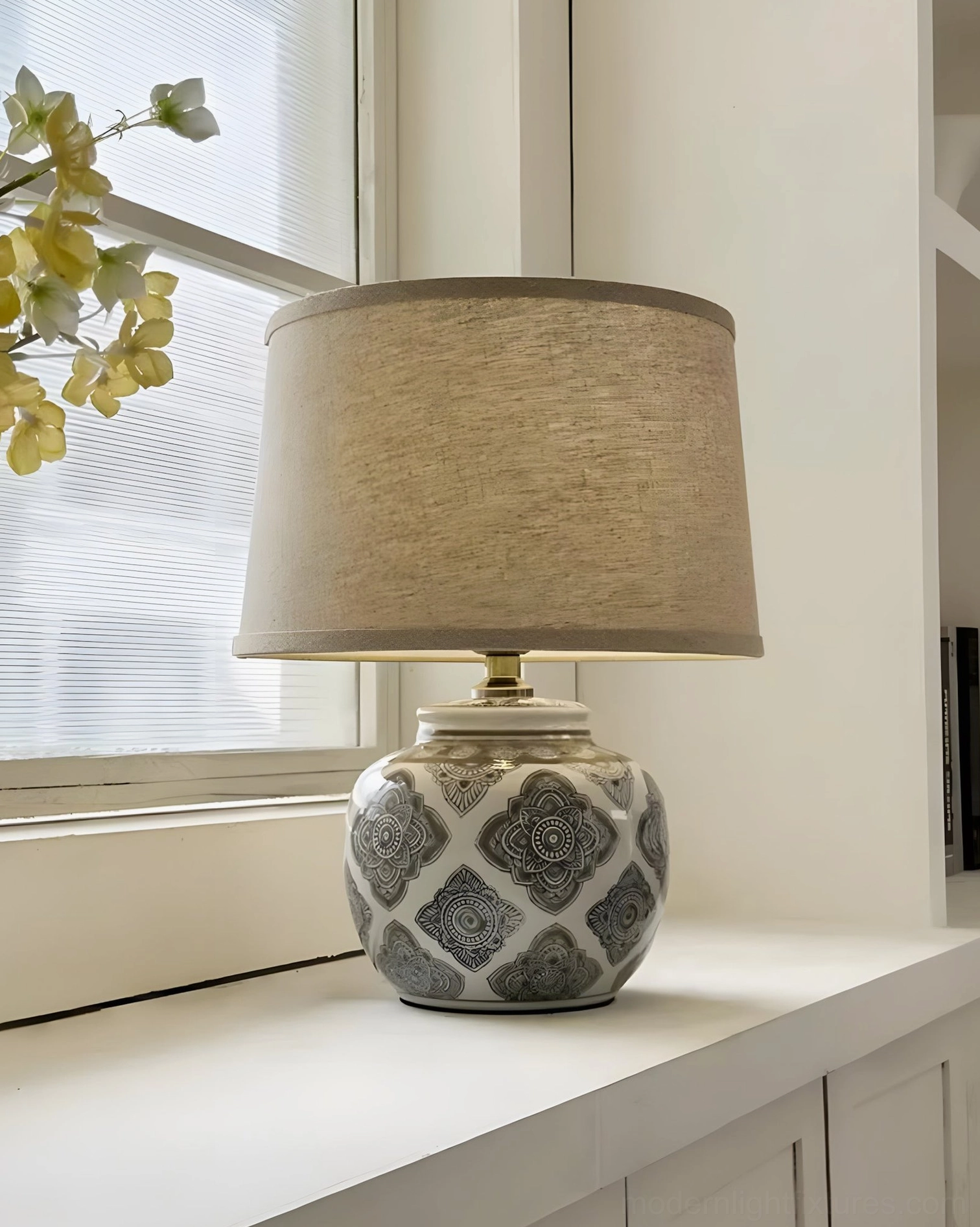 Talora handcrafted ceramic table lamp showing ceramic texture and artisanal base details
