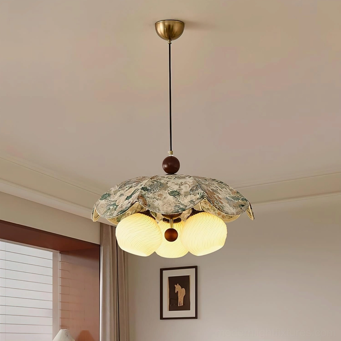 Talvera sculptural pendant lamp featuring brushed bronze finish and layered fabric canopy design
