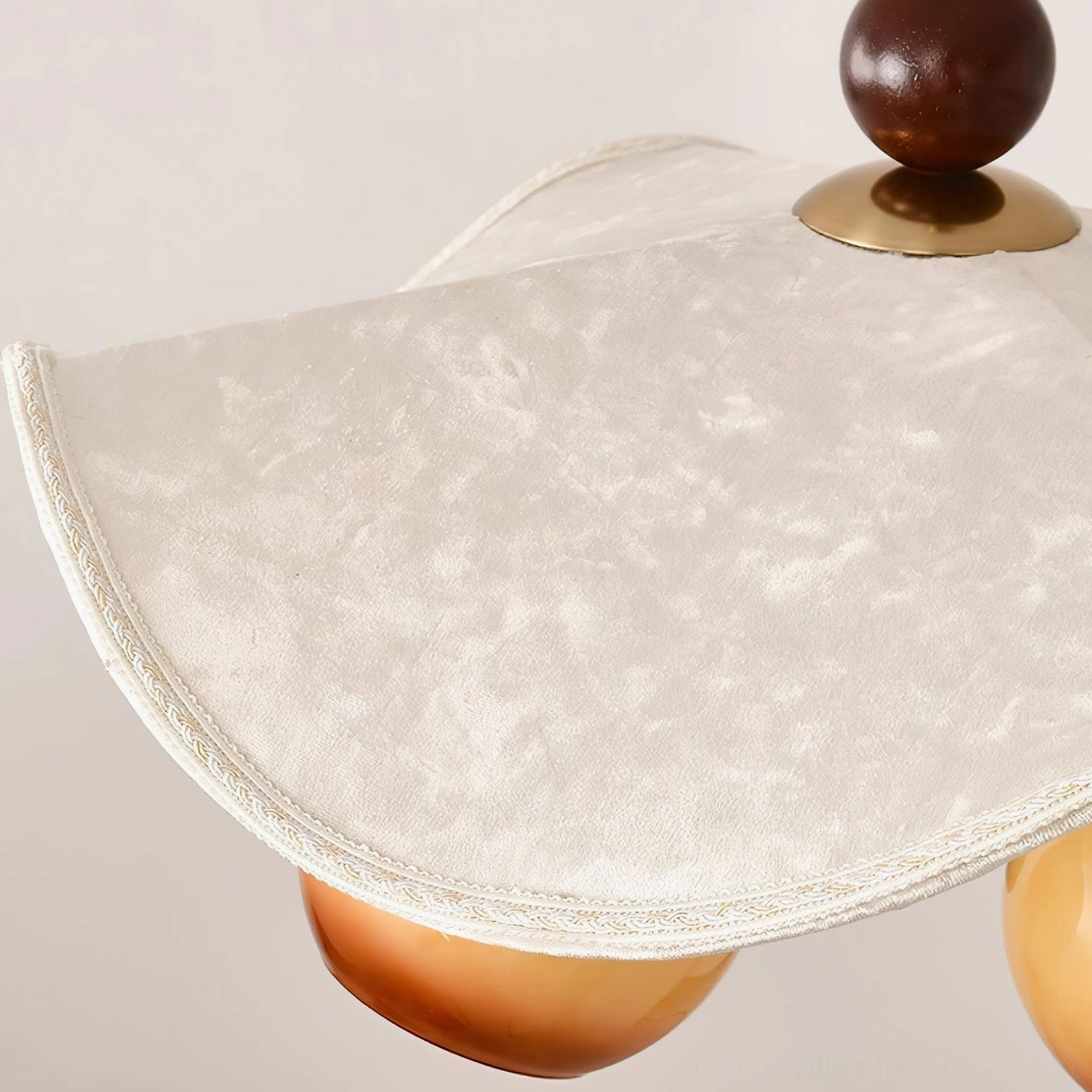 Talvera pendant light detail showing fabric canopy construction and glass orb assembly