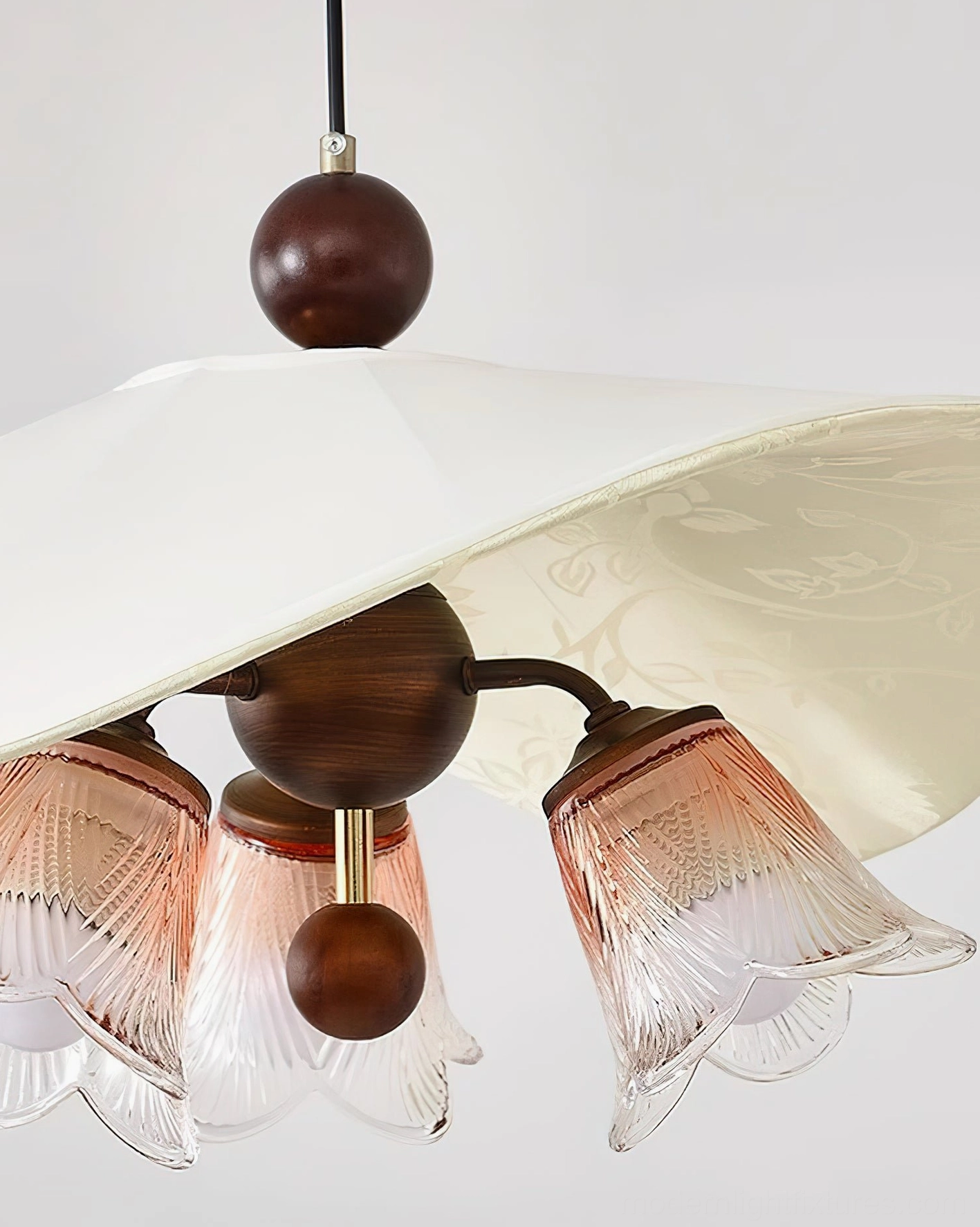 Talvera sculptural pendant light fixture showing metal framework and dimmer-compatible design