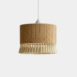 Tasmira tassel pendant light with cord-wrapped drum shade and cotton tassel fringe, studio product photo on white background