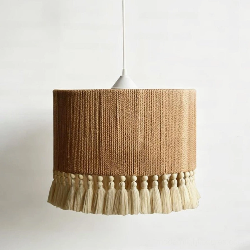 Ivory cotton cord tassel pendant light in Scandinavian minimalist interior with light wood accents