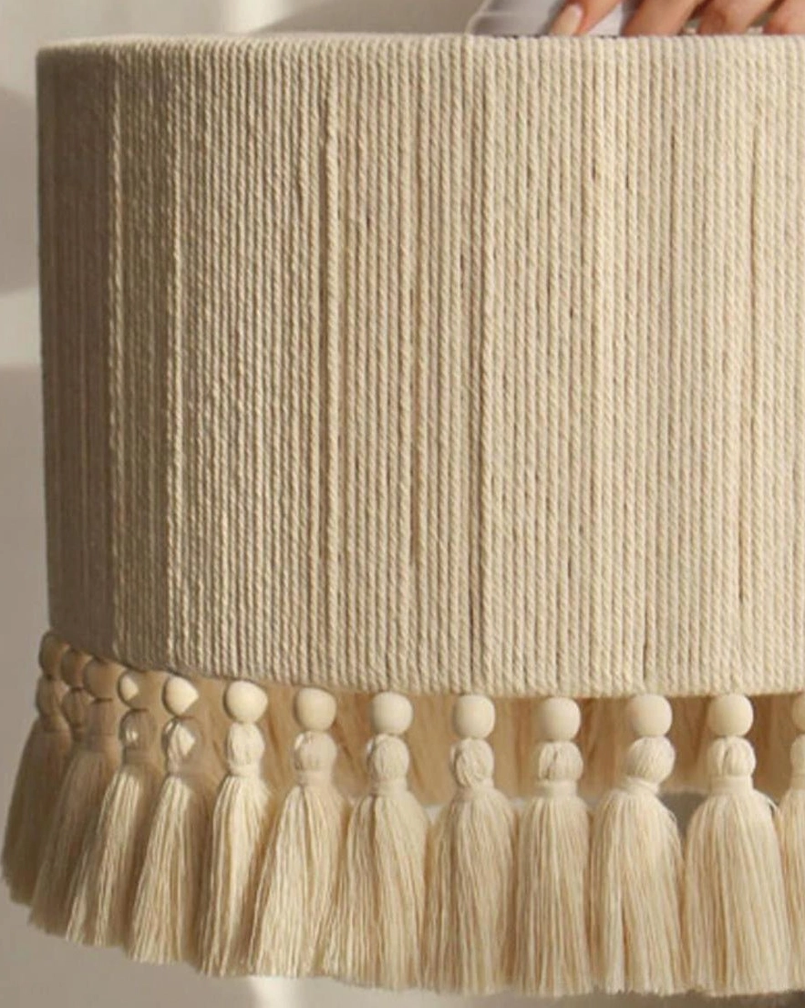 Tasmira pendant light in oatmeal natural cotton with warm beaded trim over dining table boho coastal