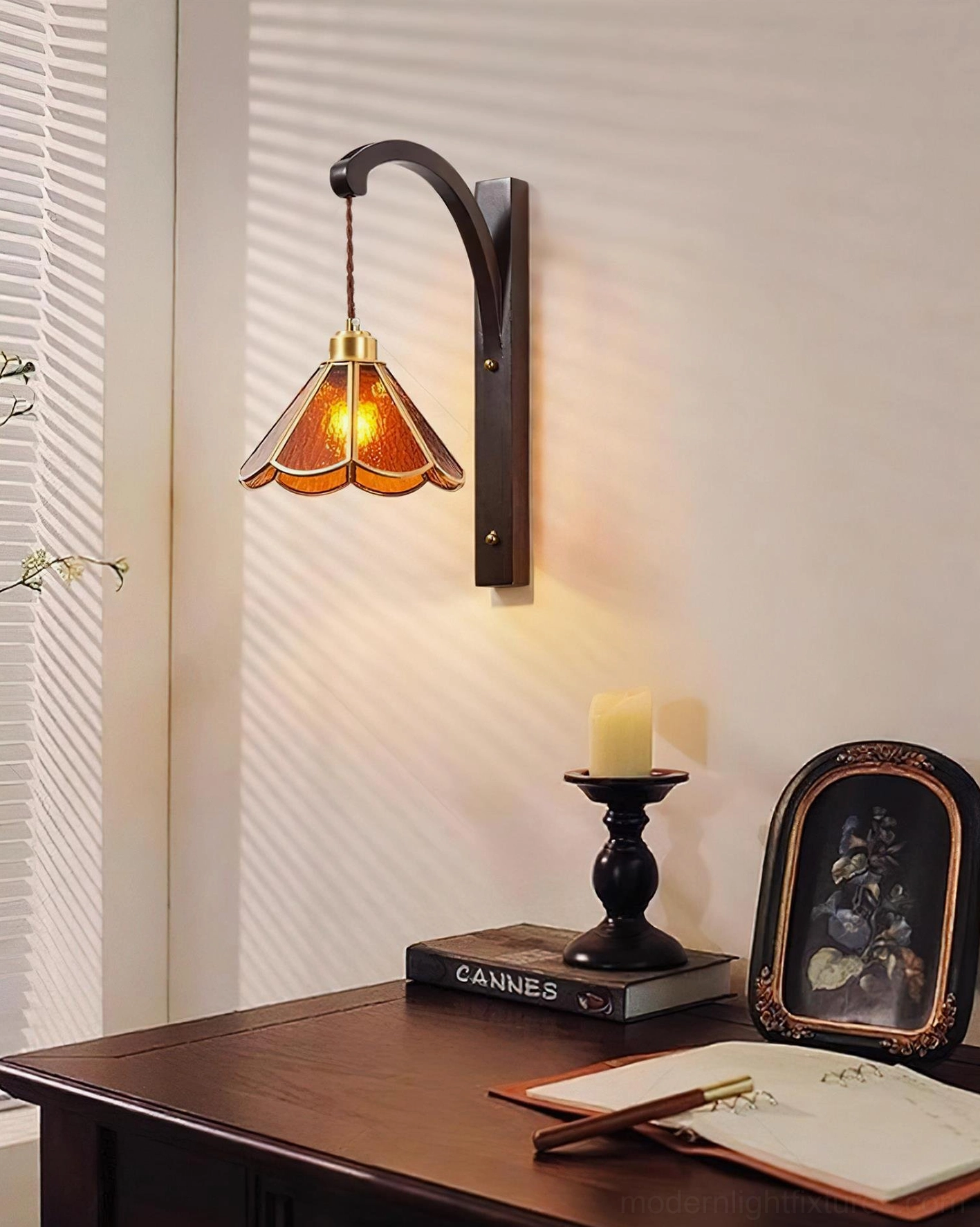 Tavelle vintage petal wall sconce beside home office desk providing warm task lighting