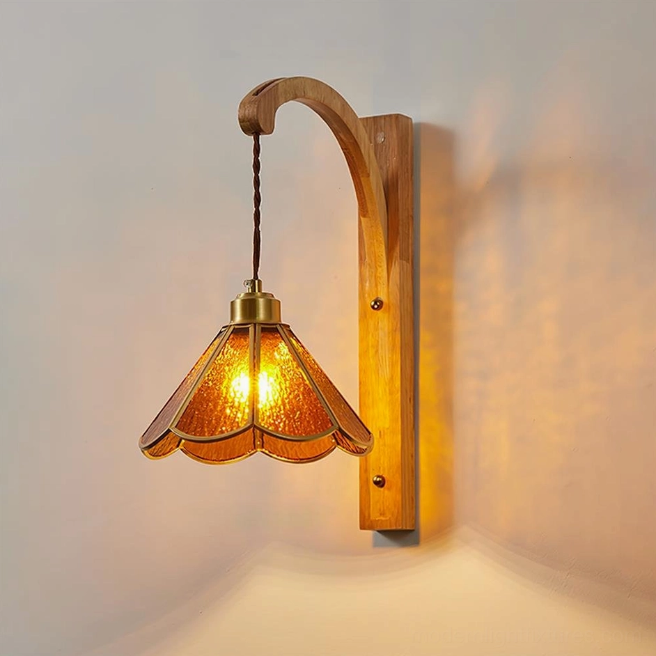 Tavelle vintage petal wall sconce with natural wood bracket and amber glass, front mounted view