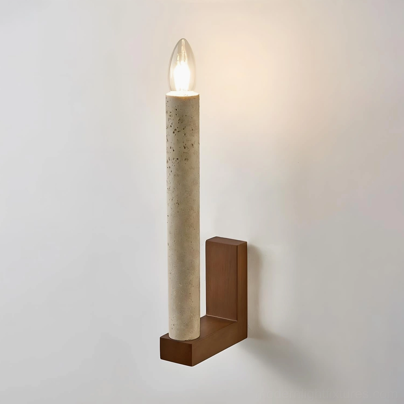 Tavero minimalist wall sconce in walnut and beige travertine, candle-style vertical silhouette design