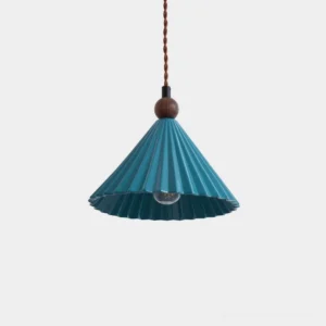 Teal pleated ceramic pendant light with twisted wood-accent cord, studio front view