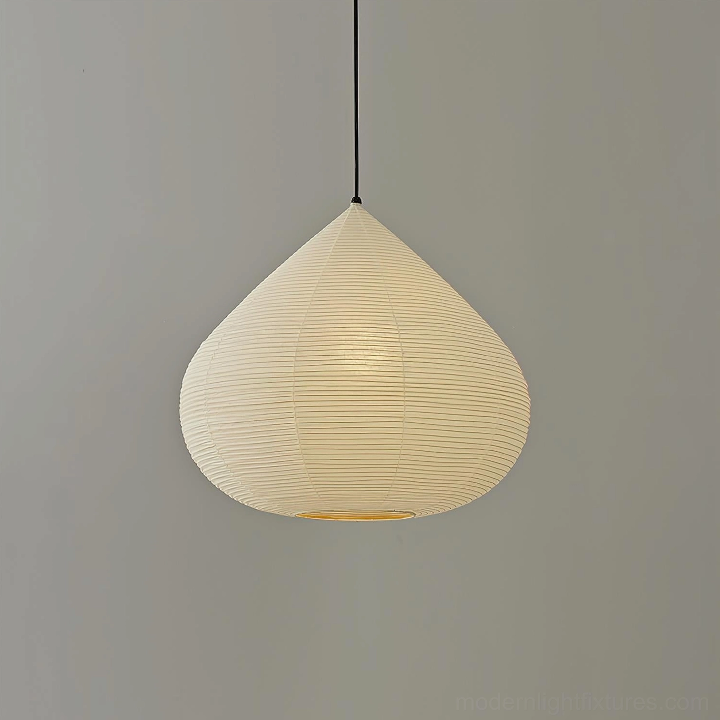 Teardrop shaped paper pendant lamp as focal point in modern bedroom design scheme